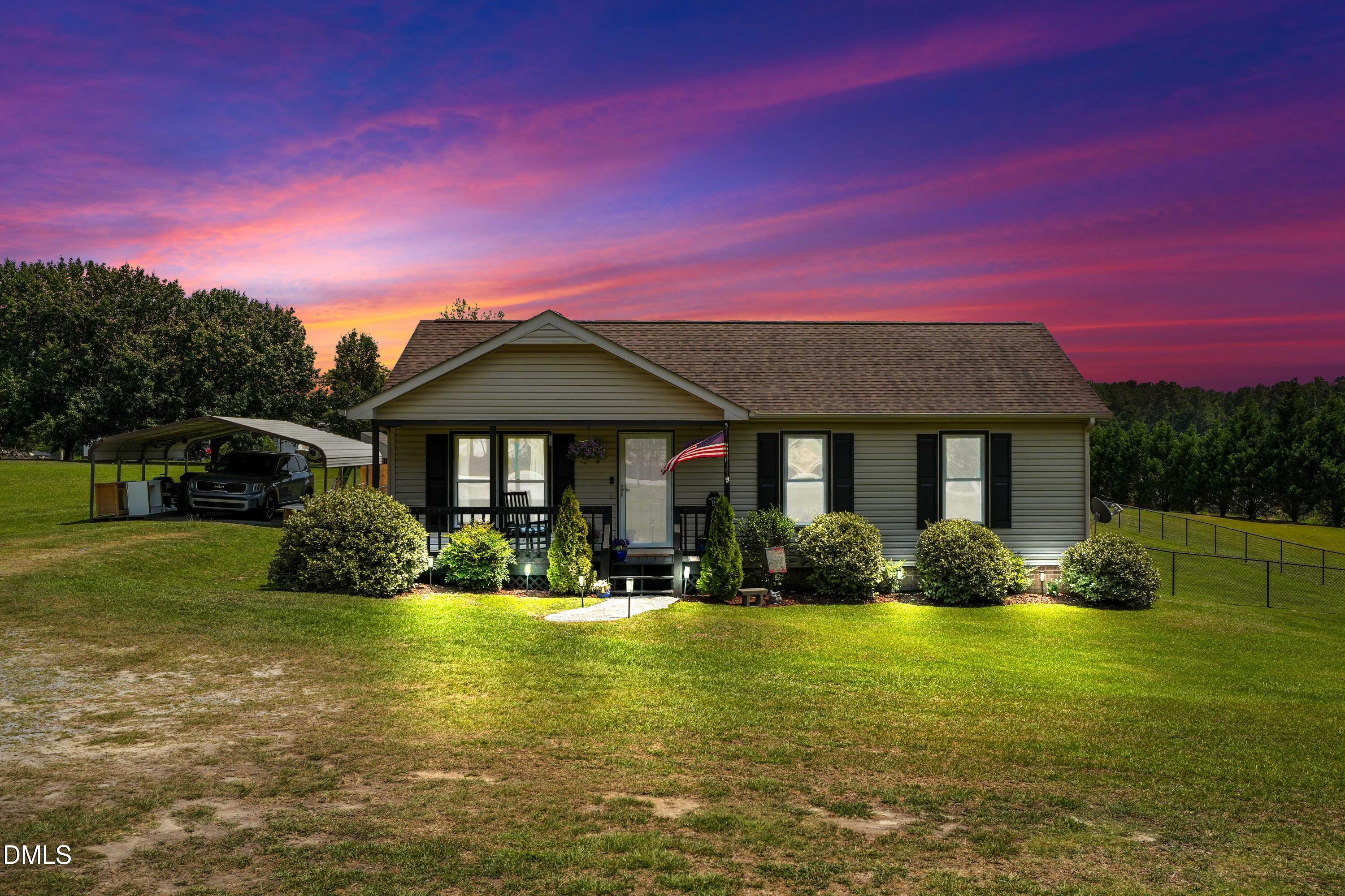 101 Stephenson Road Benson, NC 27504 - Photo 27 of 29 a front view of a house with garden