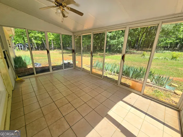 a view of an empty room and window