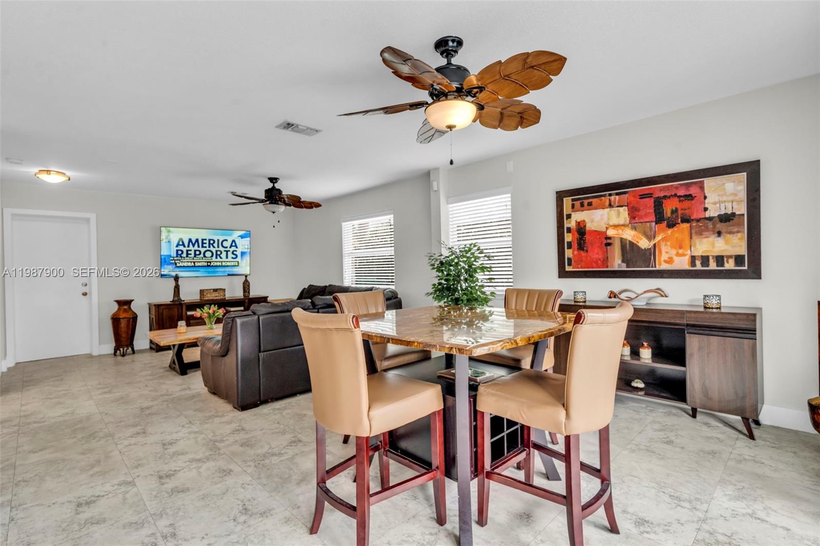 15726 Southwest 76th Terrace Miami, FL 33193 - Photo 15 of 34 a view of a livingroom and dining room