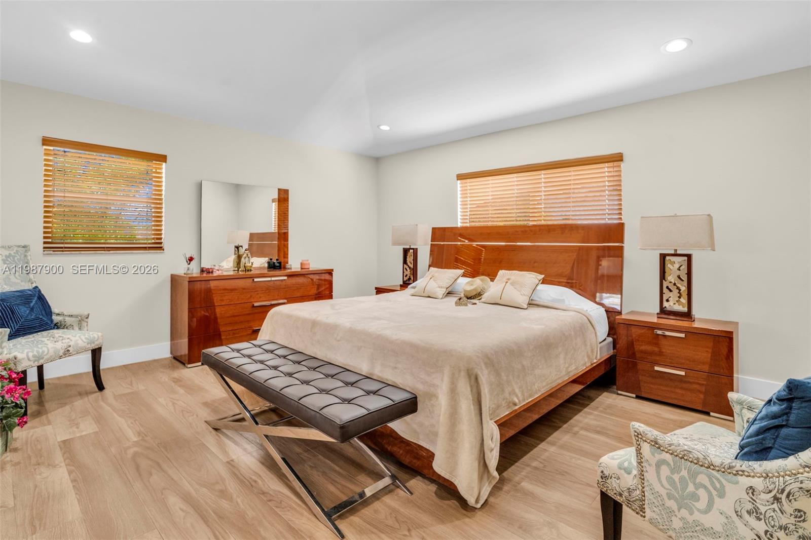 15726 Southwest 76th Terrace Miami, FL 33193 - Photo 22 of 34 a bedroom with a bed and window