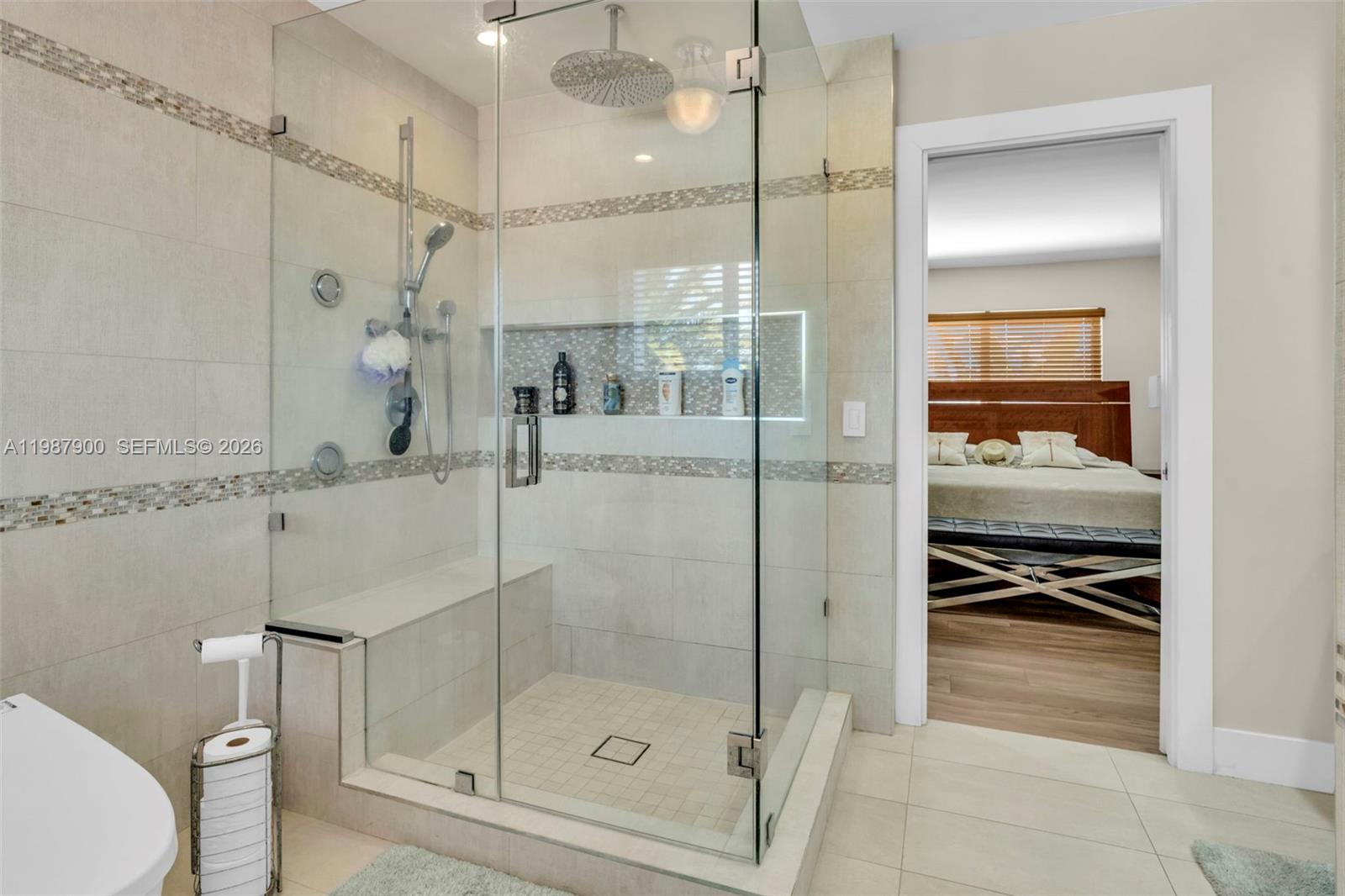 15726 Southwest 76th Terrace Miami, FL 33193 - Photo 26 of 34 a bathroom with a shower and a sink