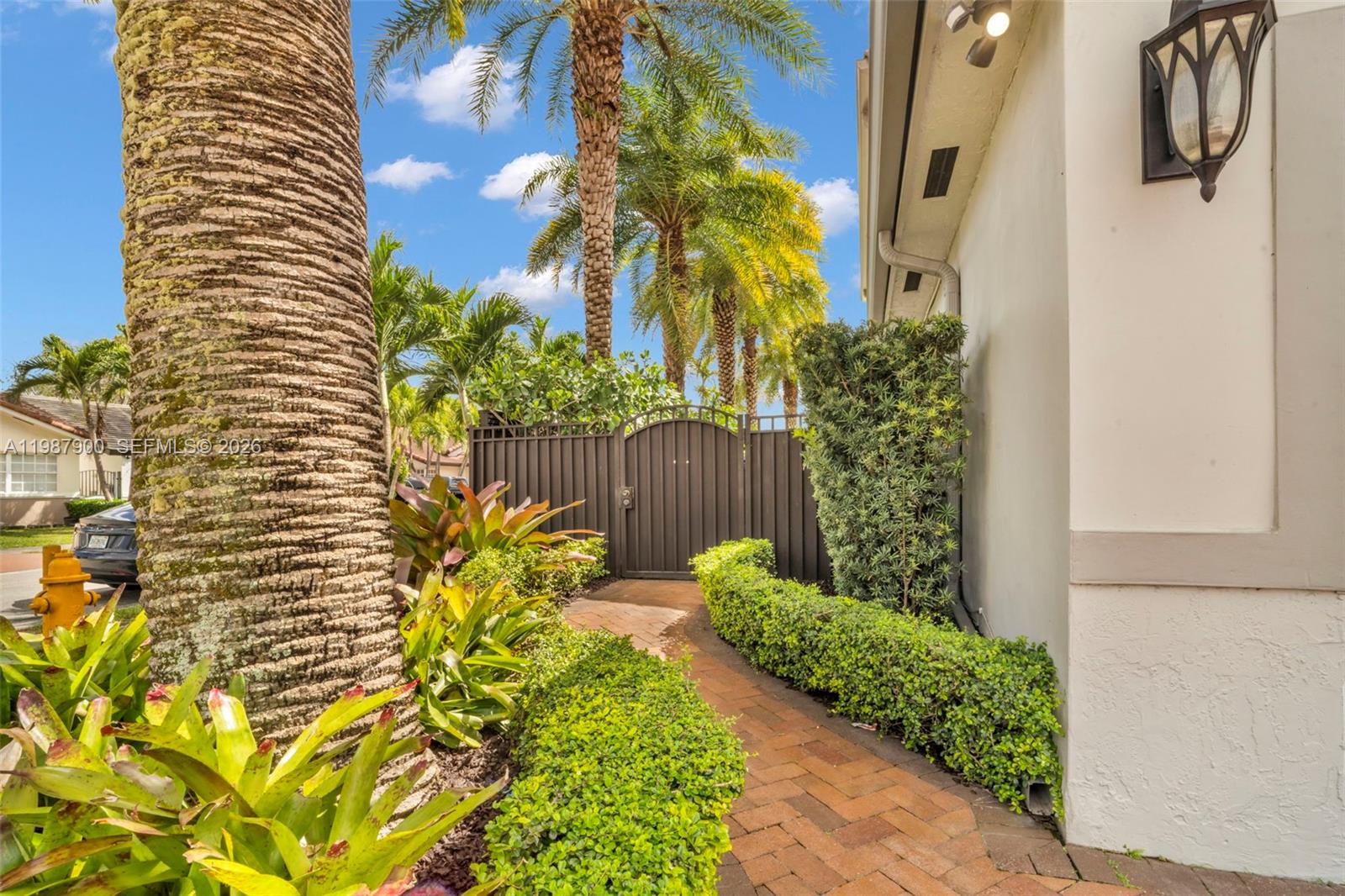 15726 Southwest 76th Terrace Miami, FL 33193 - Photo 3 of 34 a view of a yard with plants