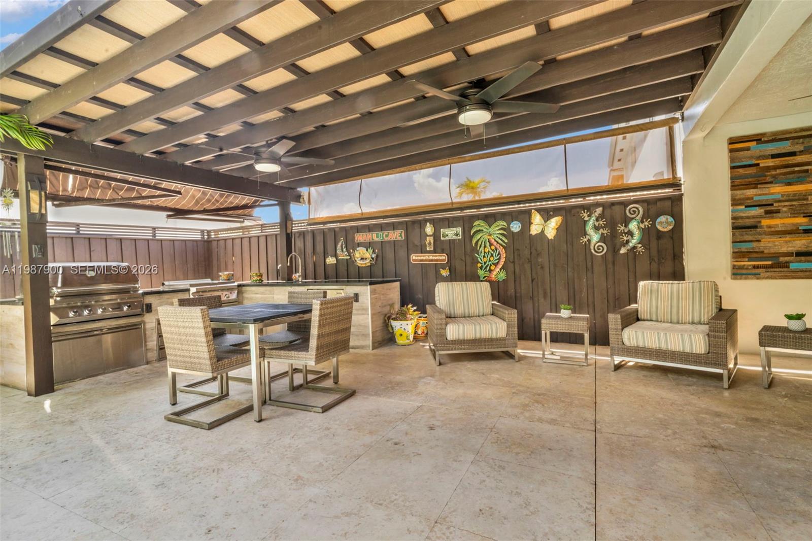 15726 Southwest 76th Terrace Miami, FL 33193 - Photo 32 of 34 a view of a chairs and tables in patio