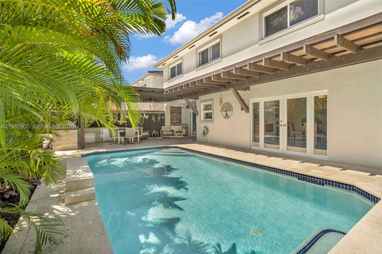 15726 Southwest 76th Terrace Miami, FL 33193 - Photo 34 of 34 a swimming pool with outdoor view