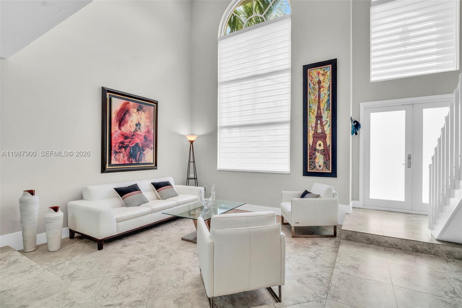 15726 Southwest 76th Terrace Miami, FL 33193 - Photo 7 of 34 a living room with furniture and a window