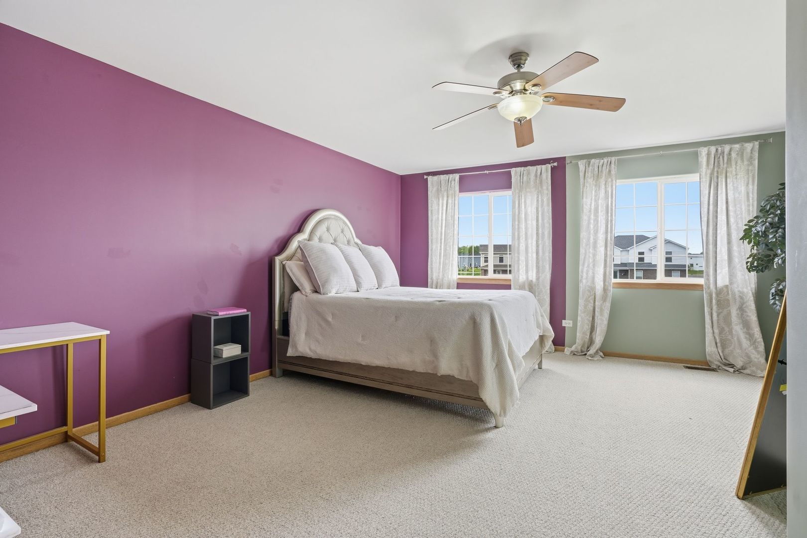 797 Kyle Court Braidwood, IL 60408 - Photo 13 of 33 a bedroom with a bed and a chandelier