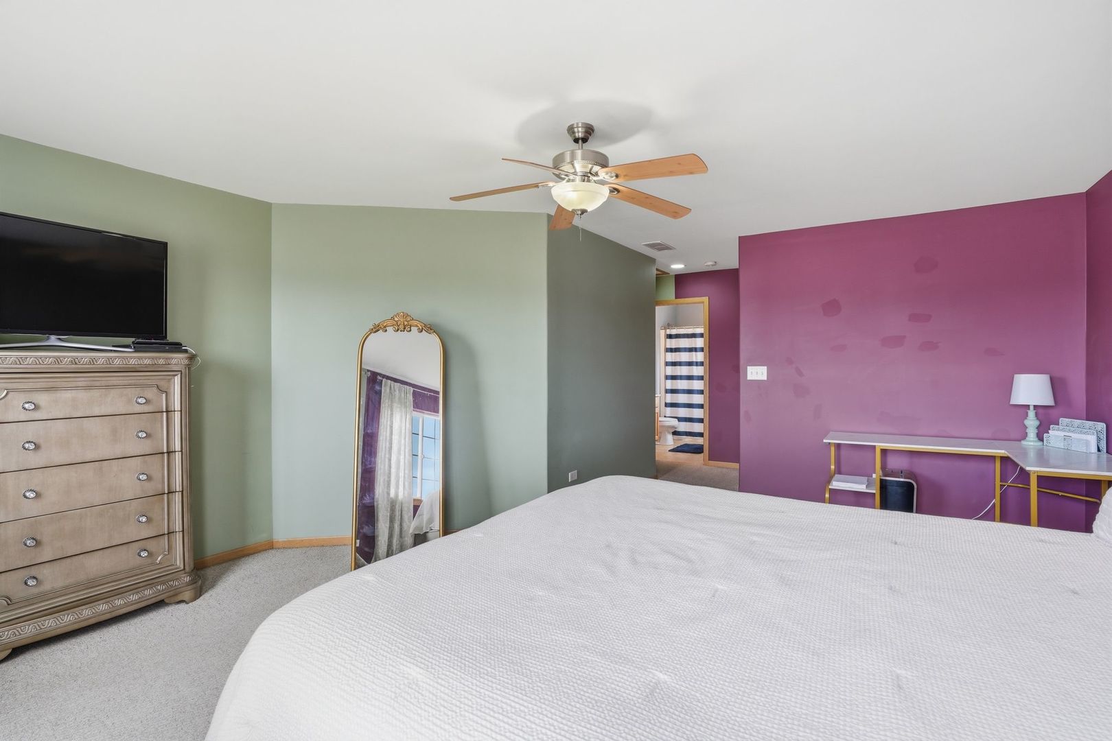 797 Kyle Court Braidwood, IL 60408 - Photo 14 of 33 a bedroom with a bed and a flat screen tv