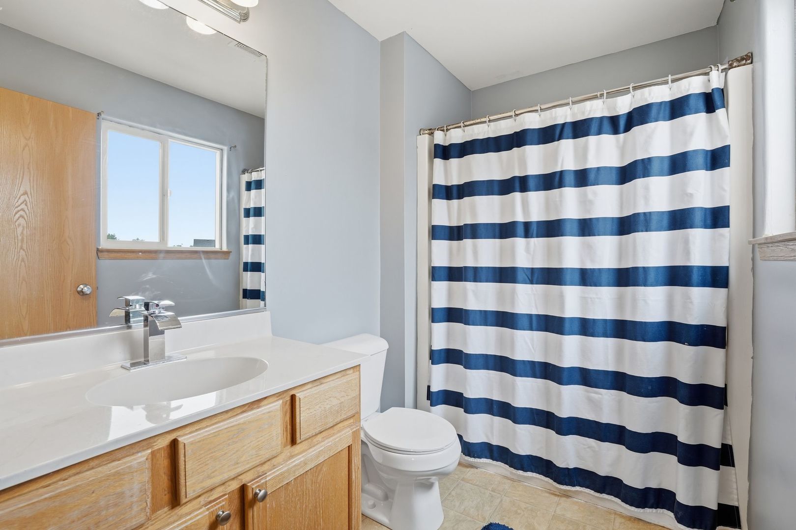 797 Kyle Court Braidwood, IL 60408 - Photo 15 of 33 a bathroom with a sink toilet and shower