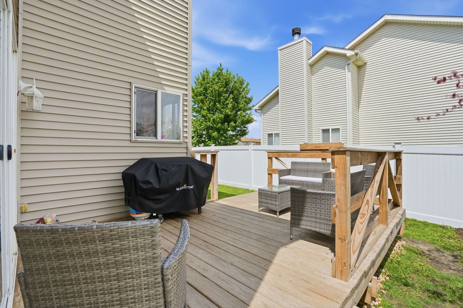 797 Kyle Court Braidwood, IL 60408 - Photo 20 of 33 a view of a deck with couches chairs and potted plants