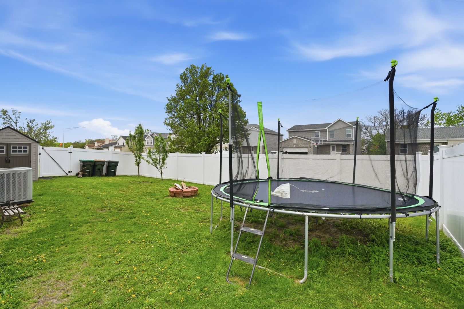 797 Kyle Court Braidwood, IL 60408 - Photo 23 of 33 a backyard of a house with table and chairs