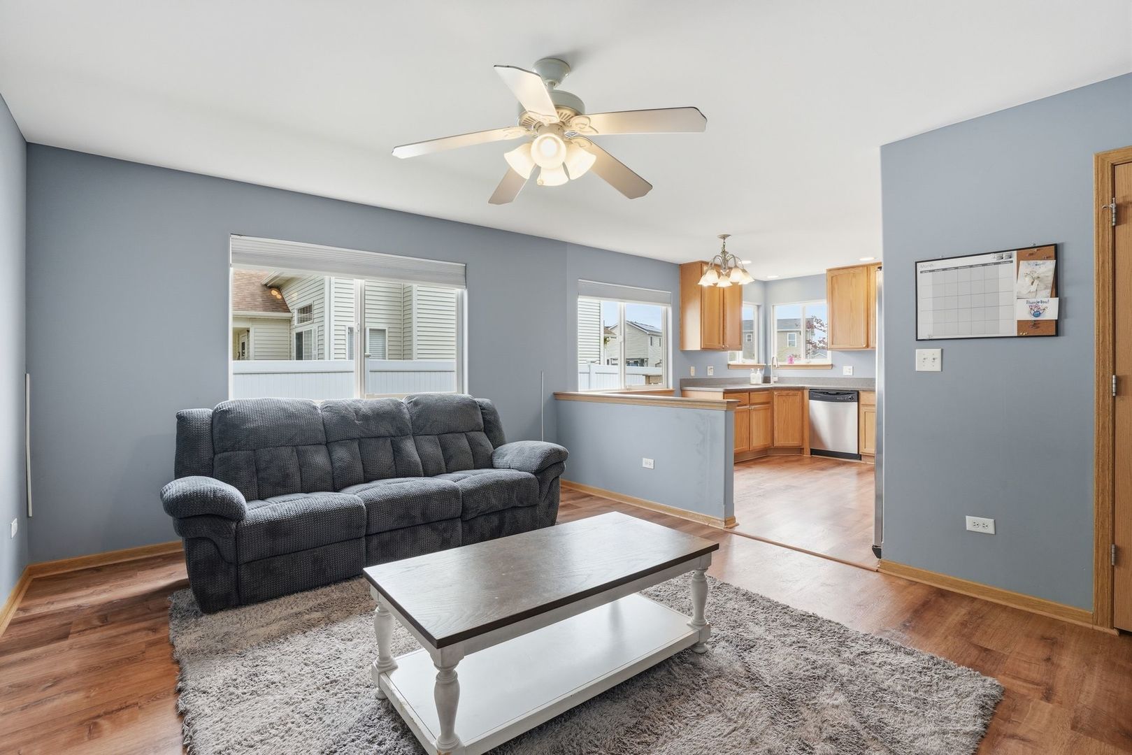 797 Kyle Court Braidwood, IL 60408 - Photo 8 of 33 a living room with furniture and kitchen view