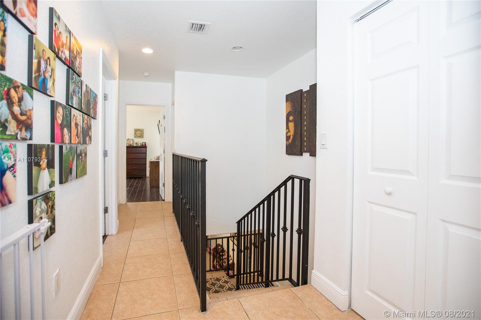 3053 Elizabeth Street, Unit 3053 Miami, FL 33133 - Photo 16 of 42 a view of hallway with stairs