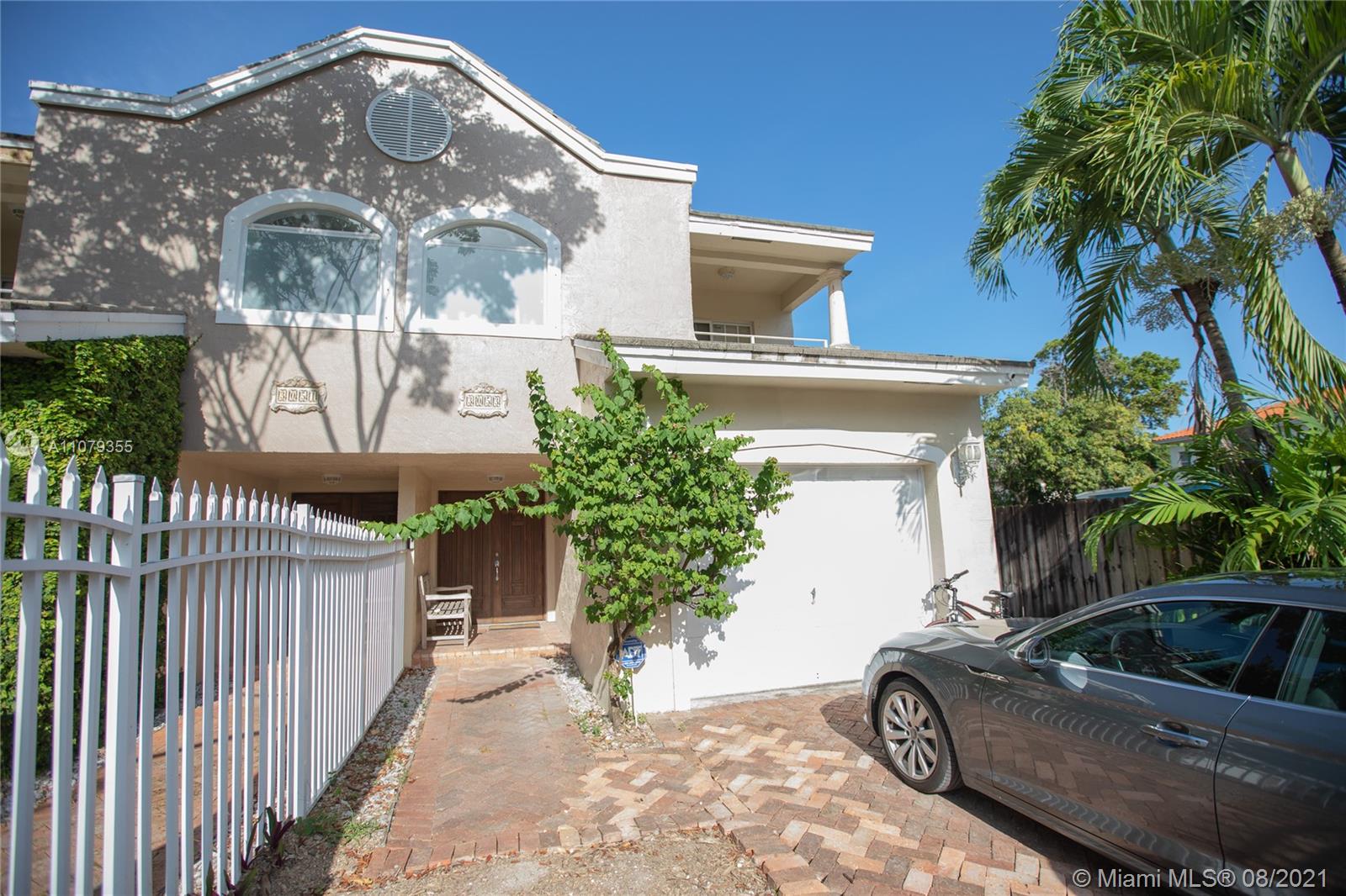 3053 Elizabeth Street, Unit 3053 Miami, FL 33133 - Photo 3 of 42 a view of a house with a yard