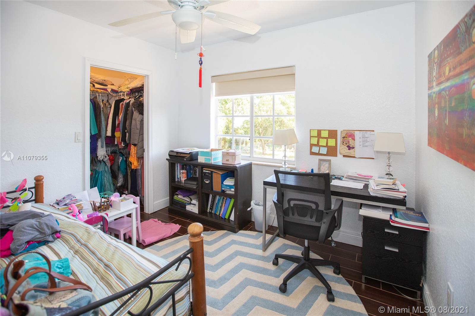 3053 Elizabeth Street, Unit 3053 Miami, FL 33133 - Photo 24 of 42 a view of a workspace with furniture and a window
