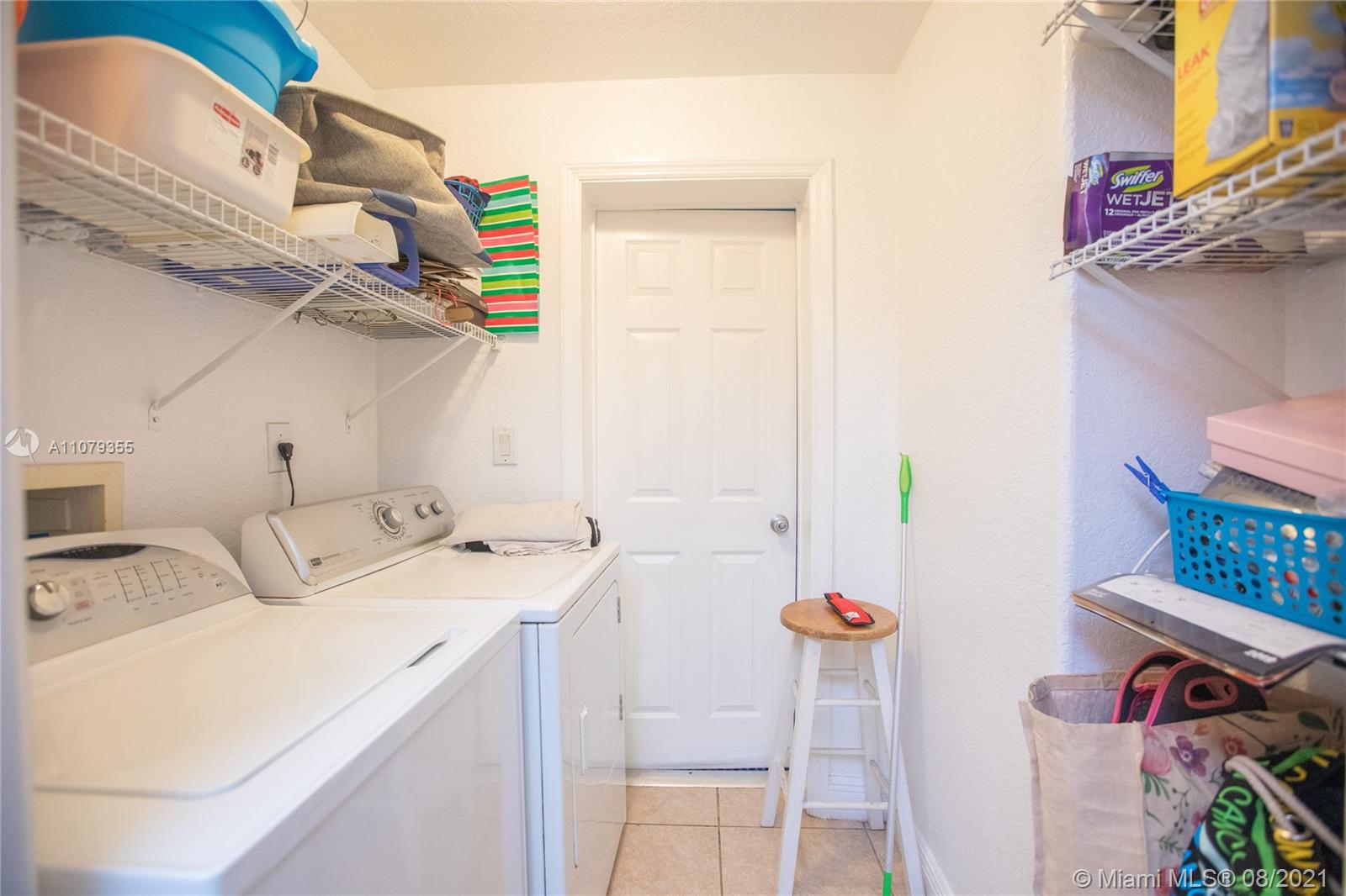 3053 Elizabeth Street, Unit 3053 Miami, FL 33133 - Photo 30 of 42 a utility room with dryer and washer
