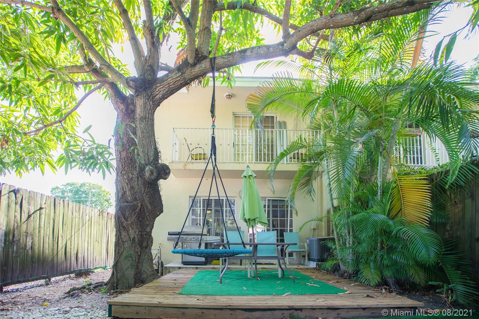 3053 Elizabeth Street, Unit 3053 Miami, FL 33133 - Photo 34 of 42 a front view of a house with a yard