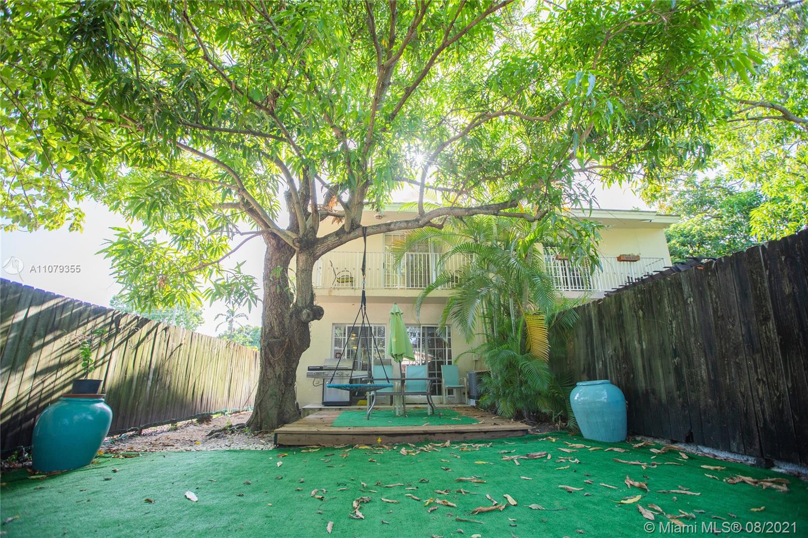3053 Elizabeth Street, Unit 3053 Miami, FL 33133 - Photo 35 of 42 a garden view with a plants and trees