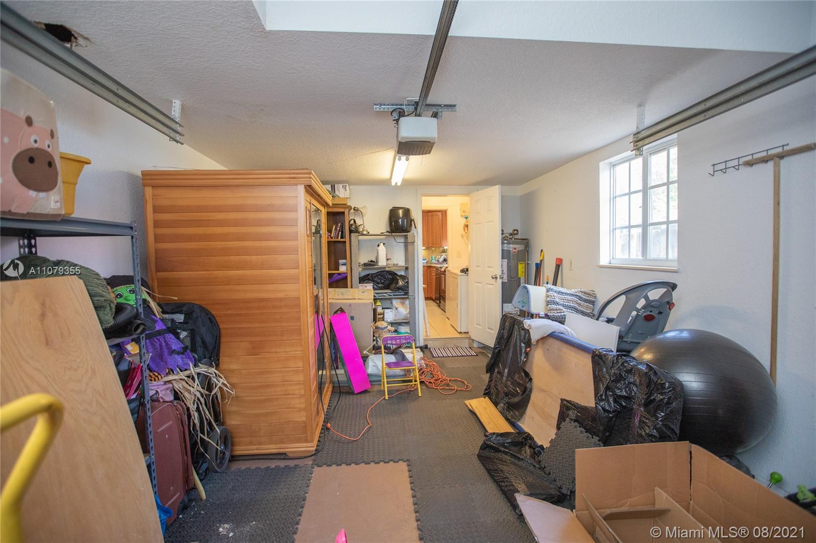 3053 Elizabeth Street, Unit 3053 Miami, FL 33133 - Photo 41 of 42 a view of a room with gym equipment