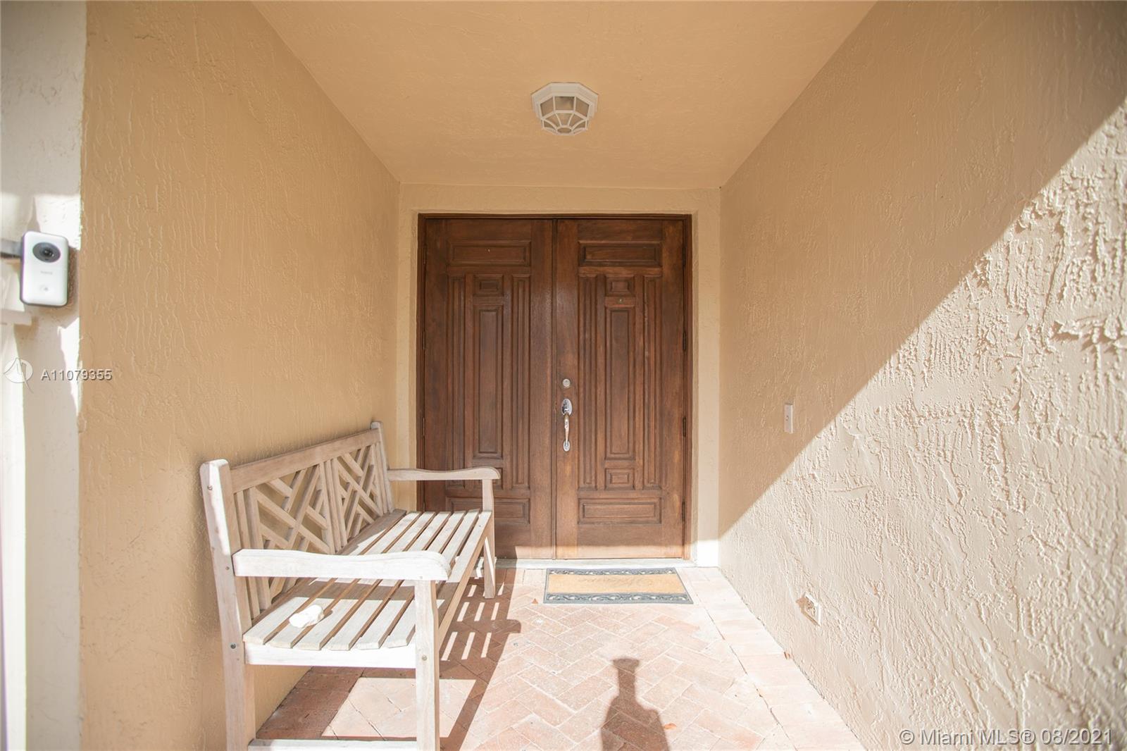 3053 Elizabeth Street, Unit 3053 Miami, FL 33133 - Photo 6 of 42 a view of wooden floor and windows