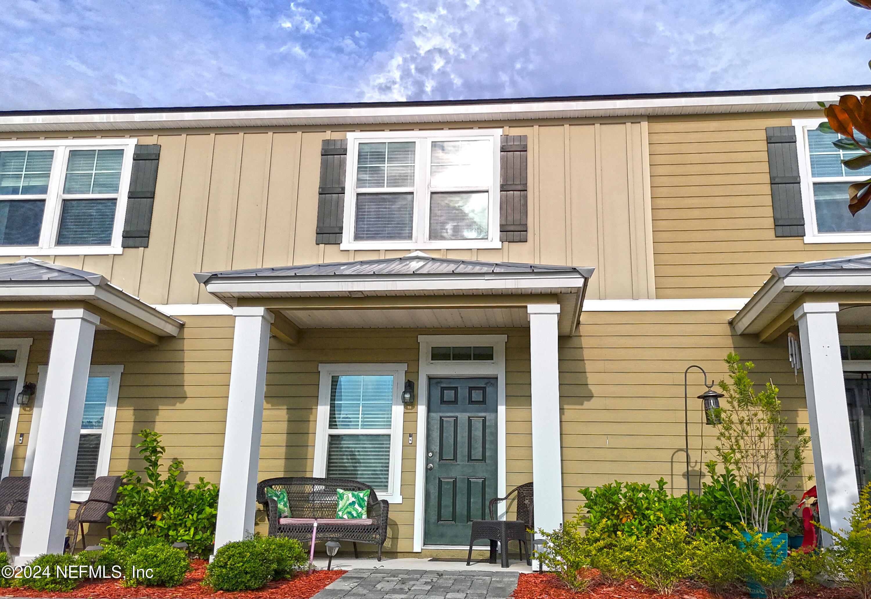 86760 Mainline Road Yulee, FL 32097 - Photo 2 of 17 front view of a house with a large window