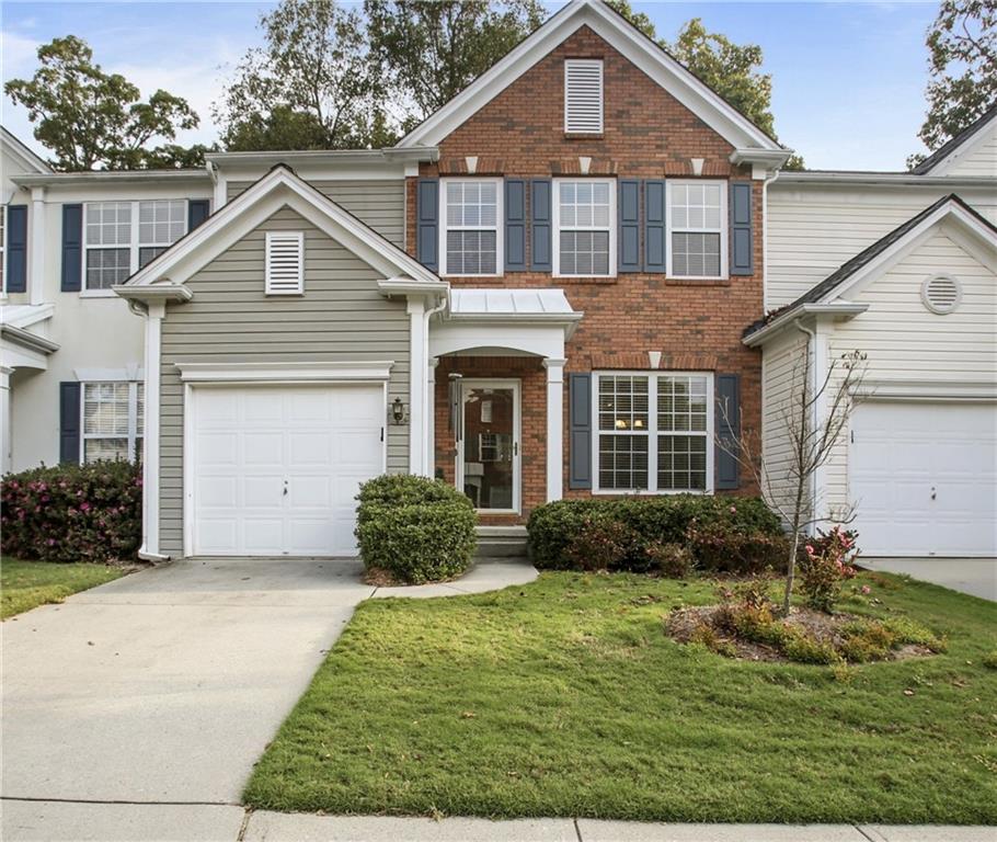 3408 Timbercreek Circle Roswell, GA 30076 - Photo 1 of 1 a front view of a house with garden