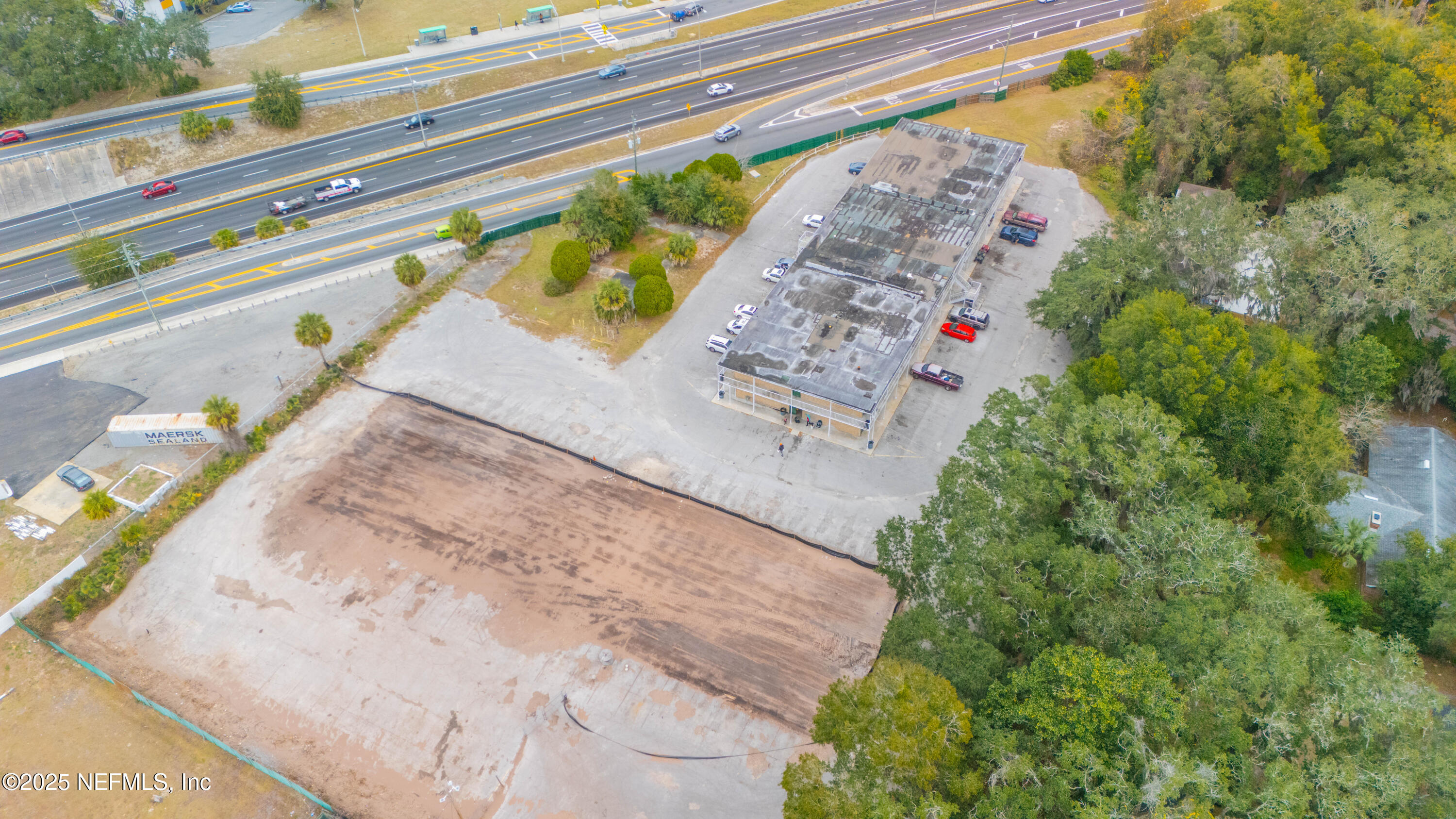747 Arlington Road North Jacksonville, FL 32211 - Photo 5 of 6 a view of a swimming pool with an outdoor space