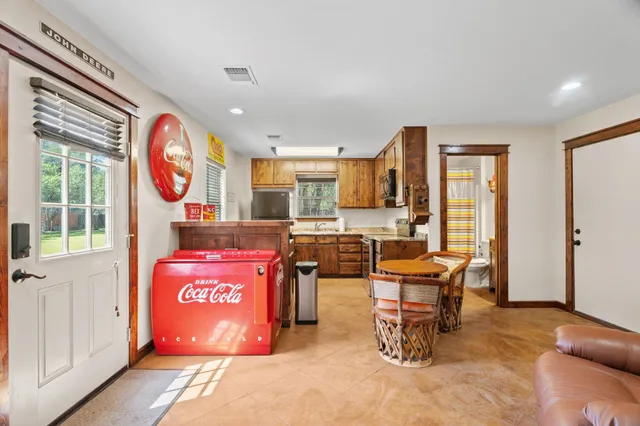 a view of dinning table and chairs in the room