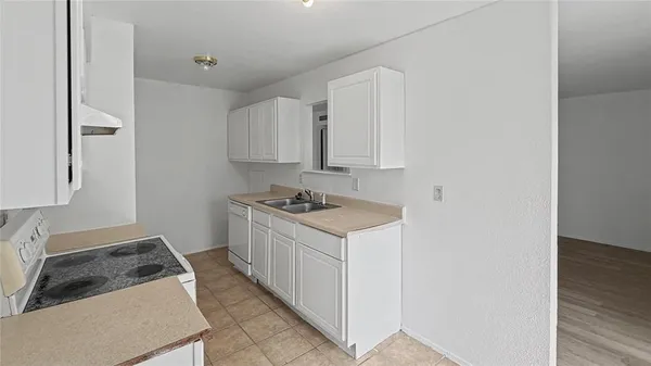 a room with a bed and a window