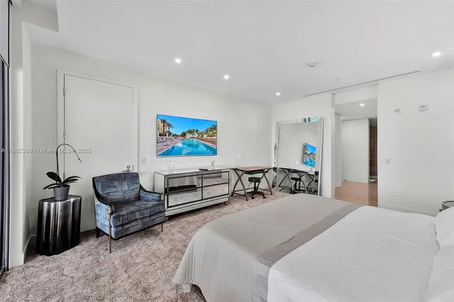 a bedroom with furniture