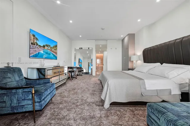 a bedroom with furniture and a couch