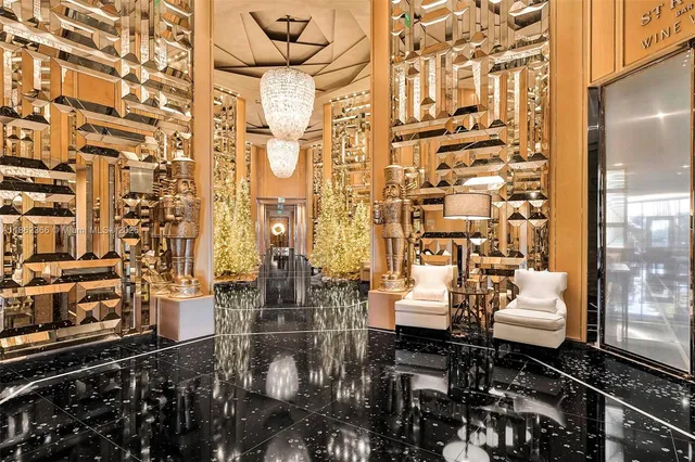 a bathroom with a granite countertop sink and a shower
