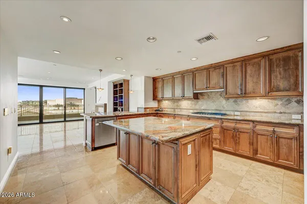 a balcony with furniture and city view