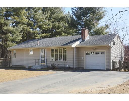 13 Red Barn Road Wayland, MA 01778 - Photo 1 of 19 a front view of a house with a yard
