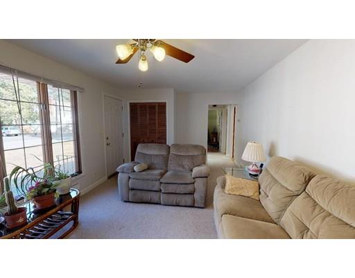 13 Red Barn Road Wayland, MA 01778 - Photo 3 of 19 a living room with furniture and a large window