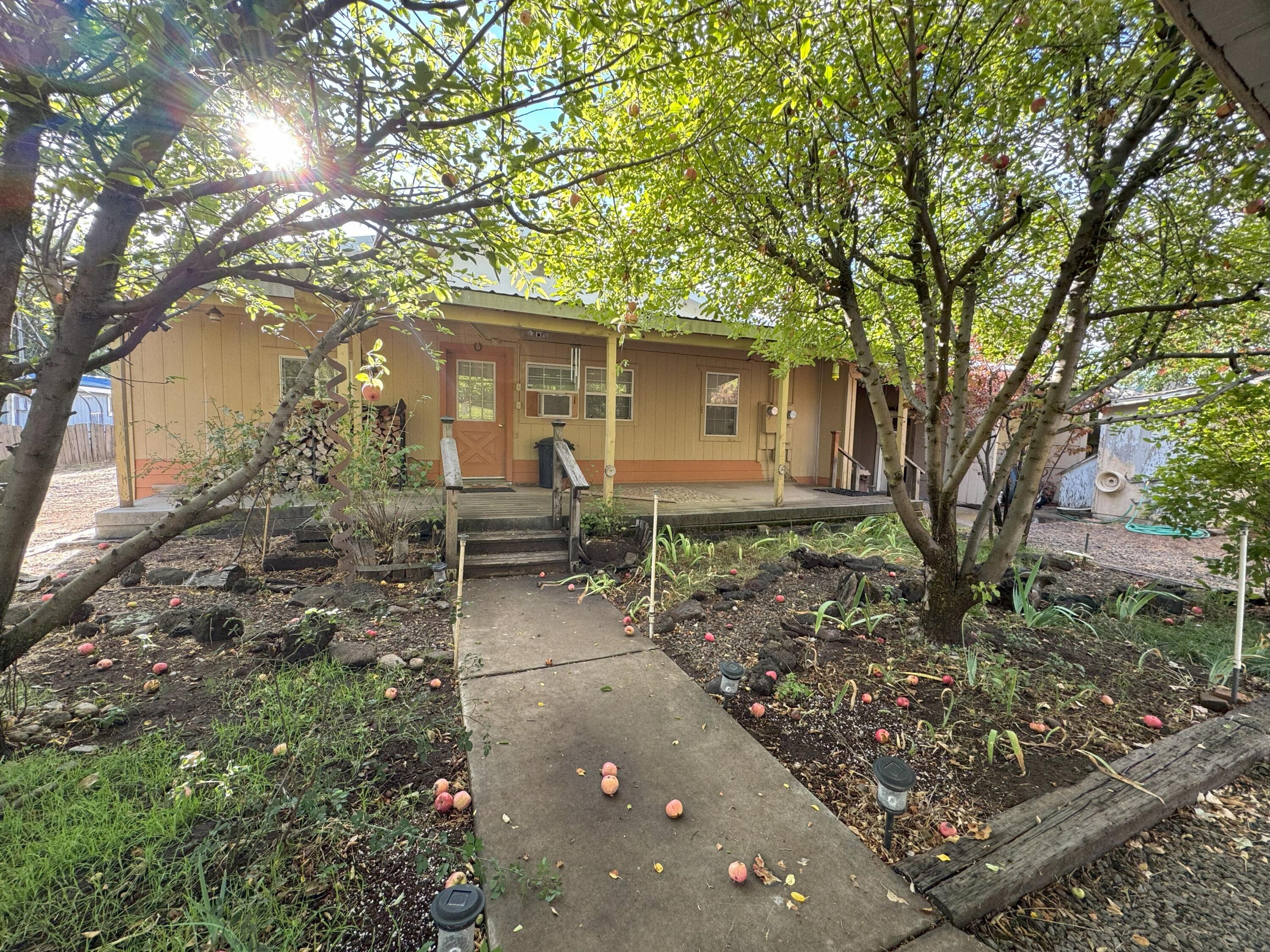 a backyard of a house with lots of green space