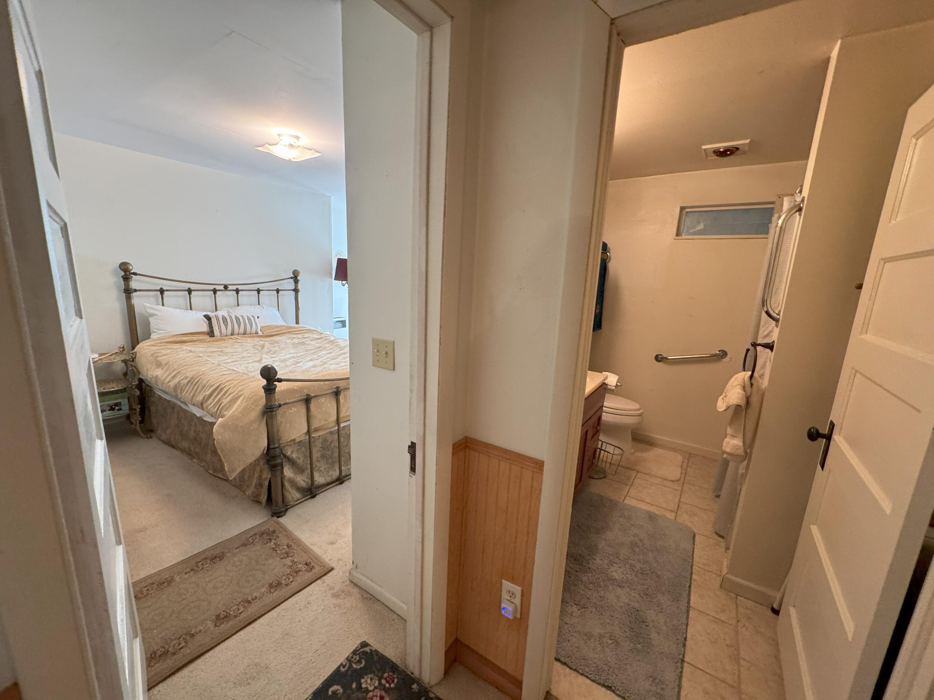 25991 Cir Bell Road Fall River Mills, CA 96028 - Photo 20 of 61 a bathroom with a tub and shower