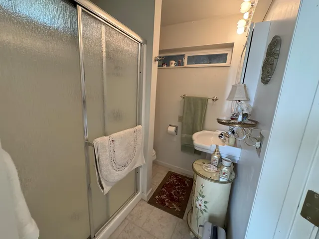 a room with furniture and musical instruments