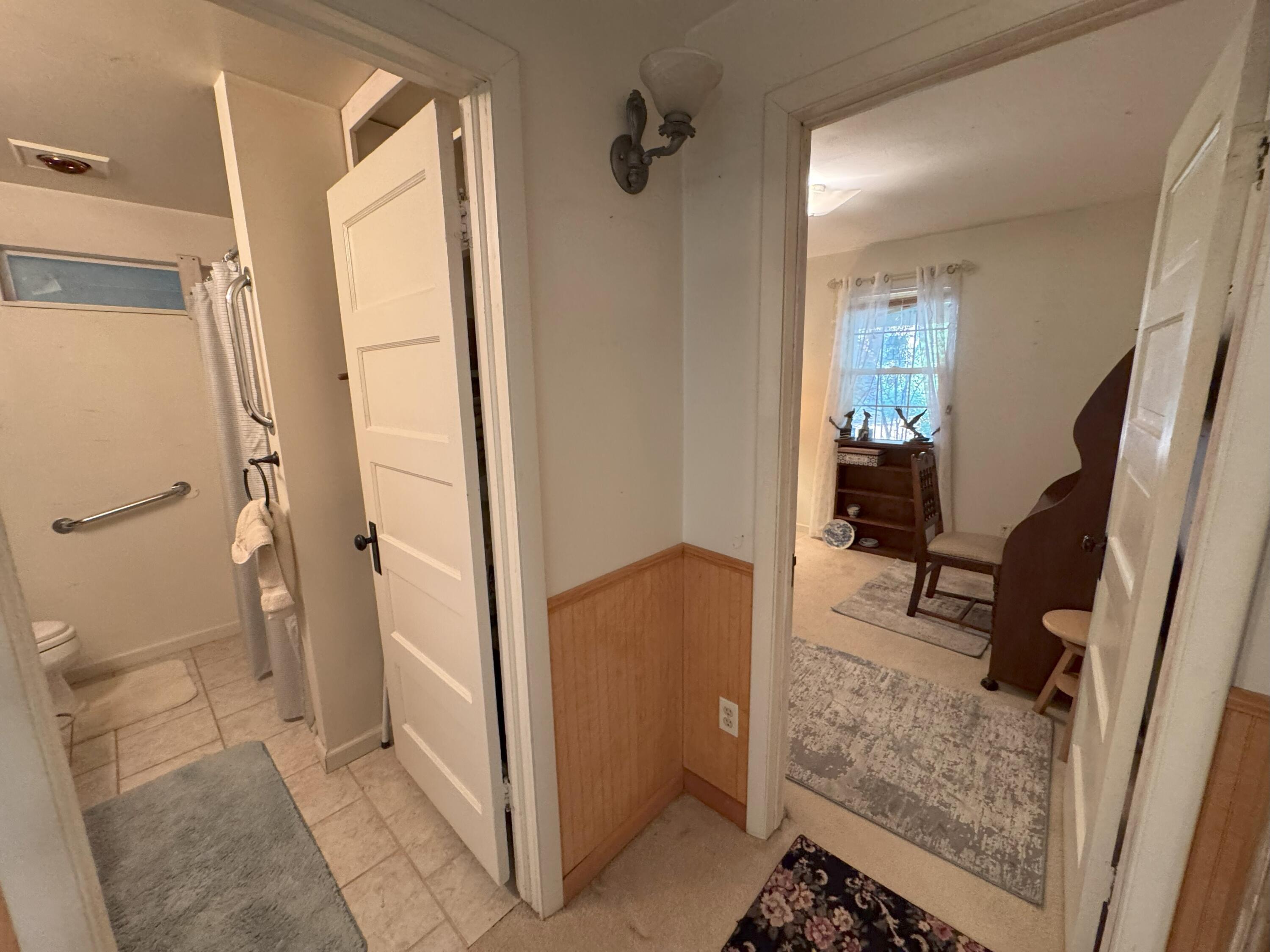 25991 Cir Bell Road Fall River Mills, CA 96028 - Photo 27 of 61 a view of a bathroom from the hallway