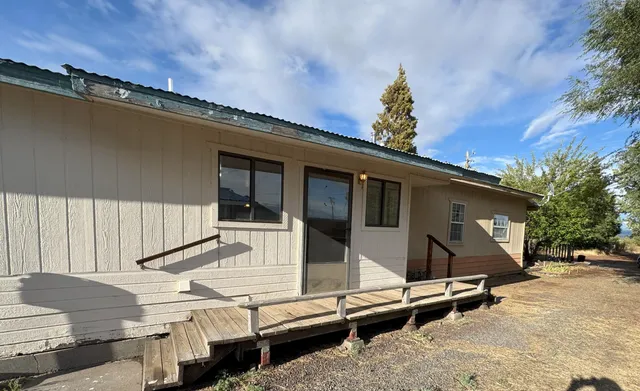 a bathroom with a toilet a sink and bathtub