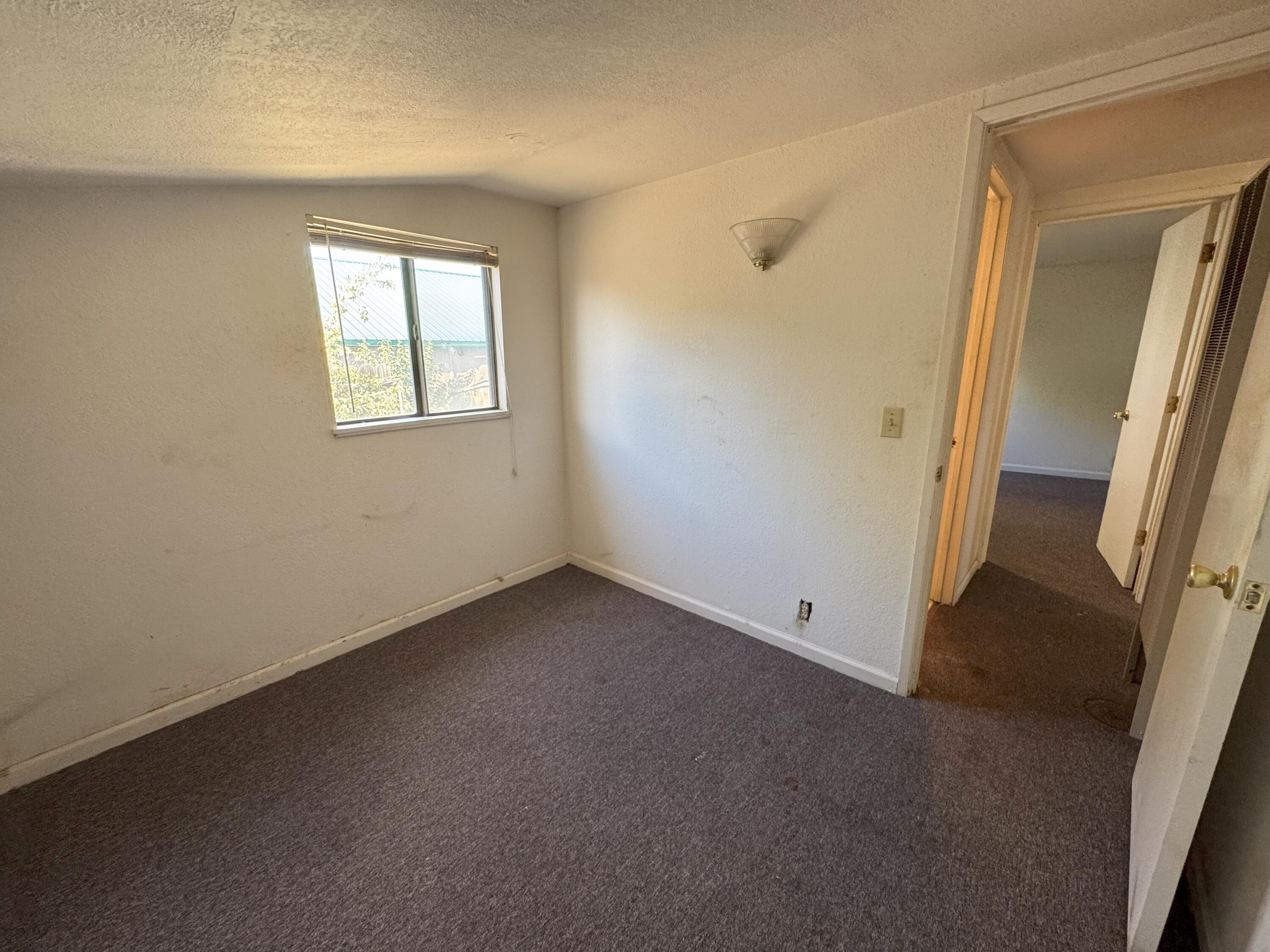 25991 Cir Bell Road Fall River Mills, CA 96028 - Photo 46 of 61 an empty room with a window