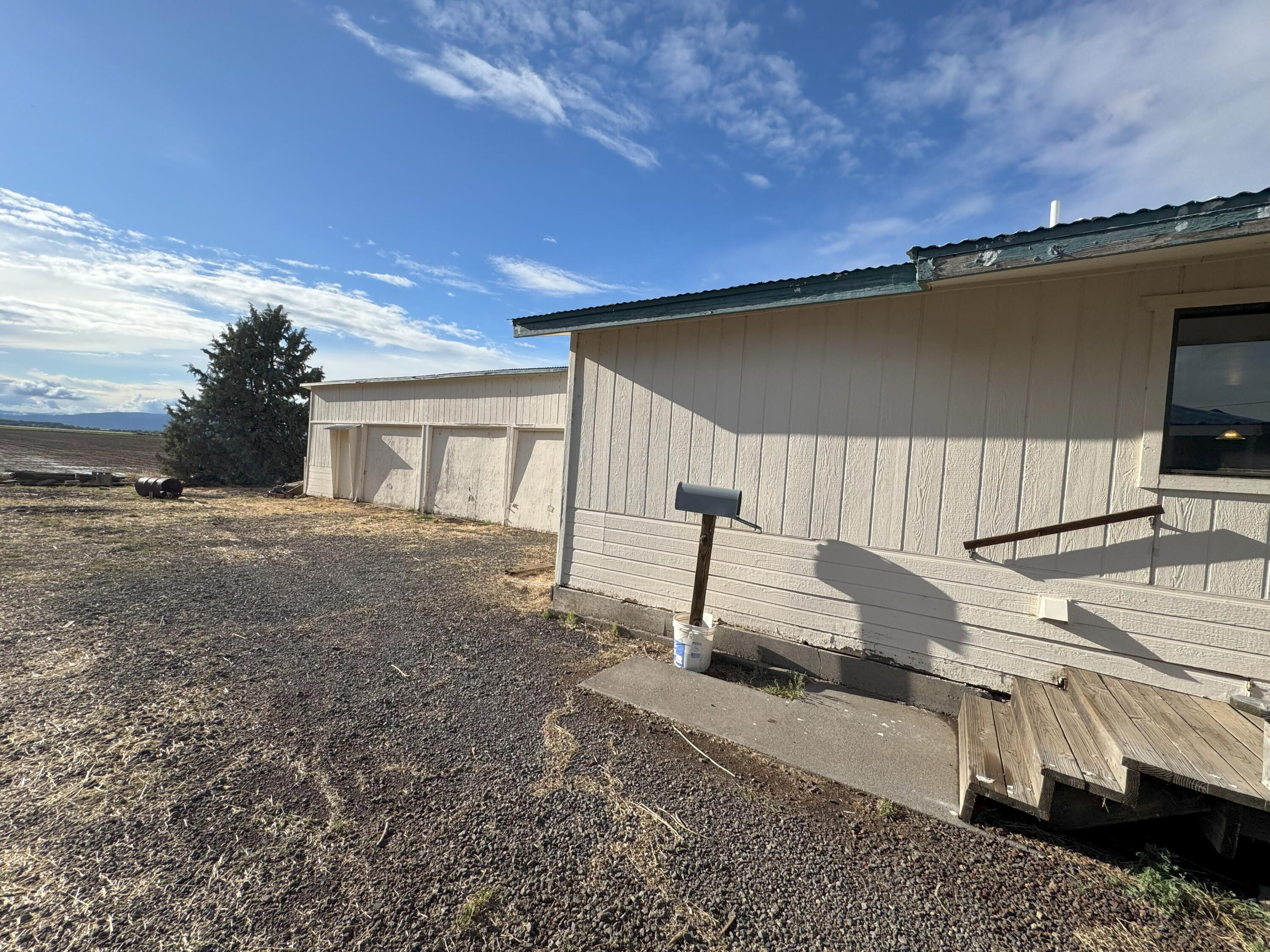 25991 Cir Bell Road Fall River Mills, CA 96028 - Photo 49 of 61 a front view of a house with a yard