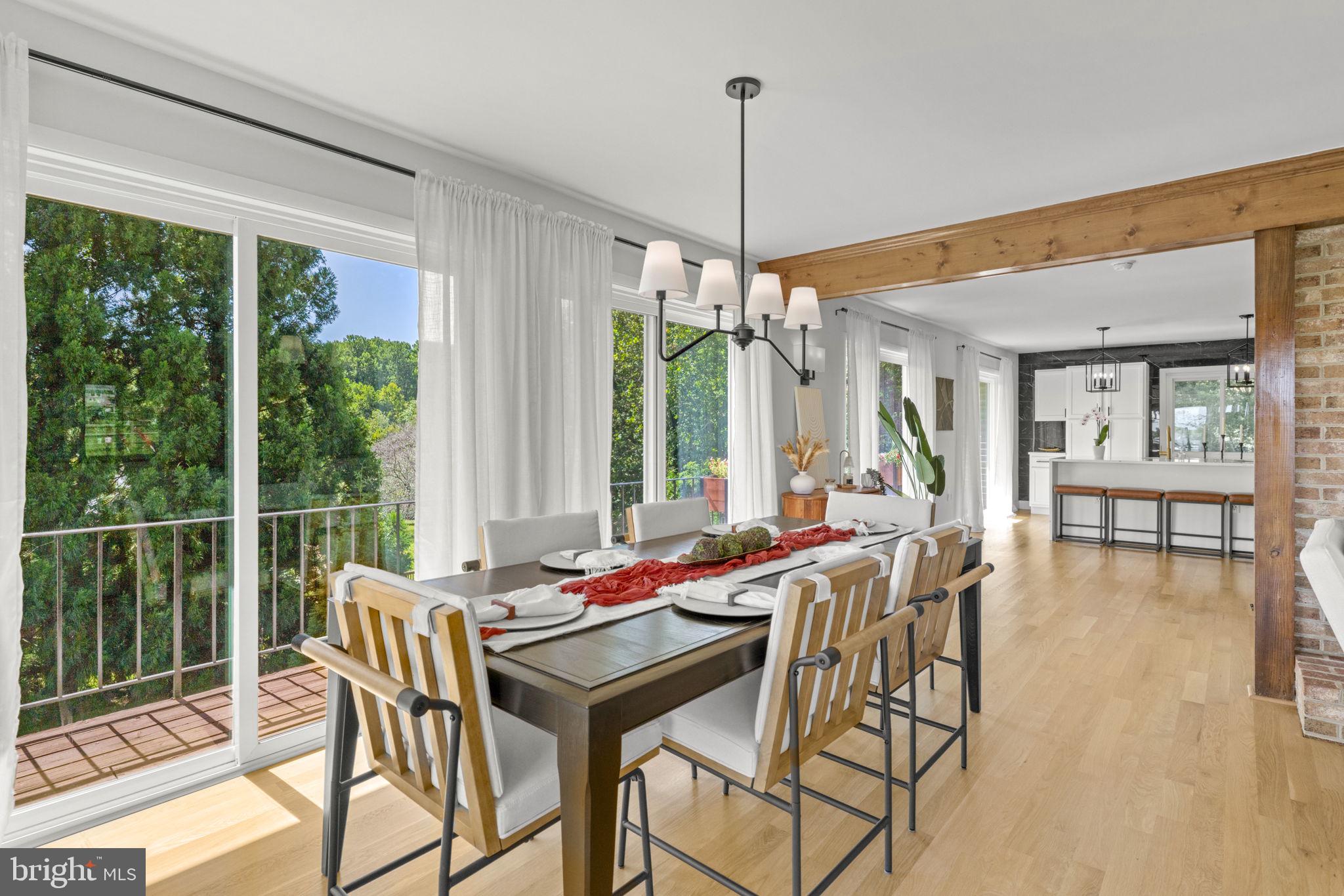 6970 Kim Lane Friendship, MD 20758 - Photo 17 of 50 a view of a dining room with furniture window and wooden floor