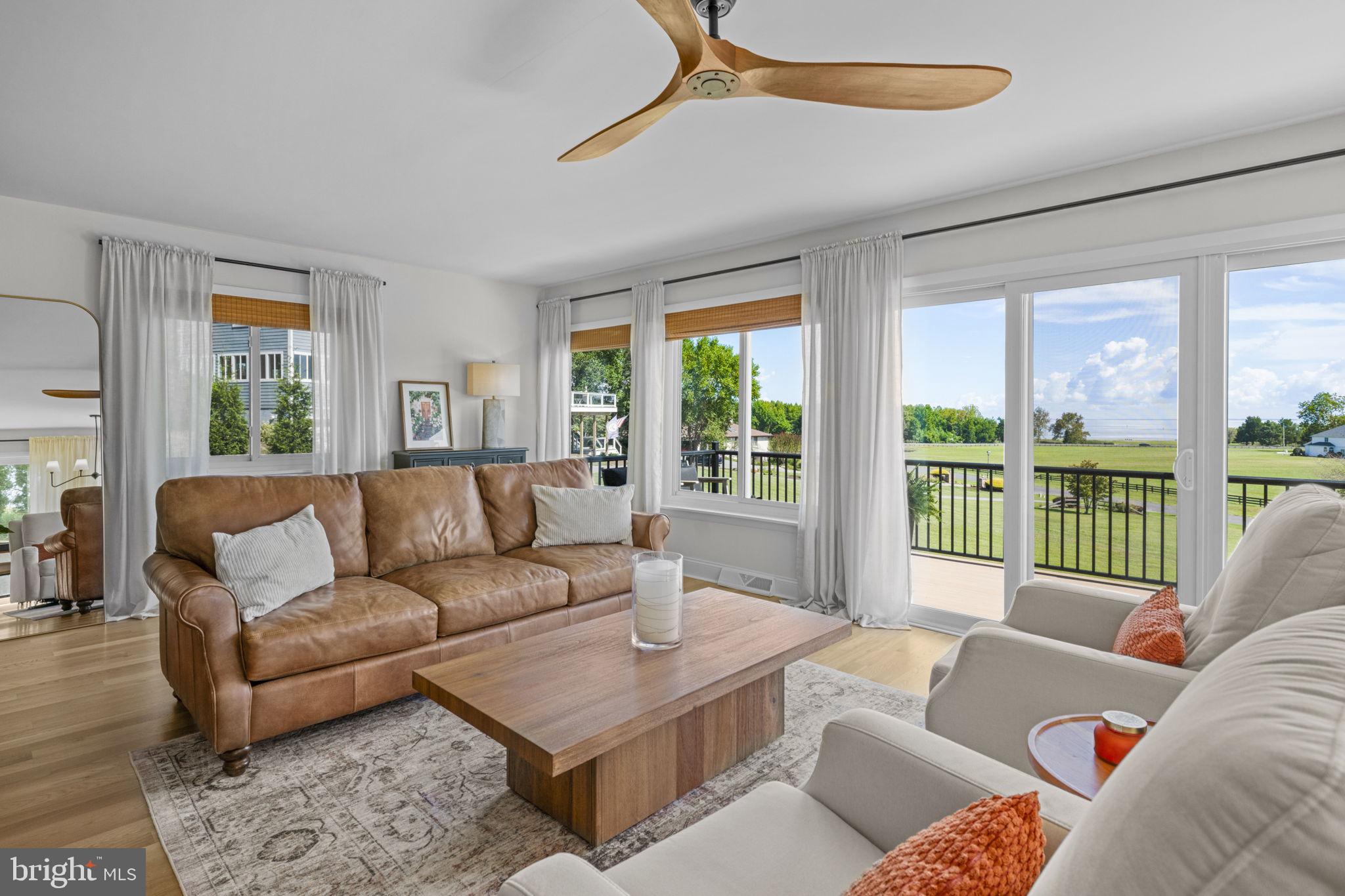 6970 Kim Lane Friendship, MD 20758 - Photo 18 of 50 a living room with furniture and a large window