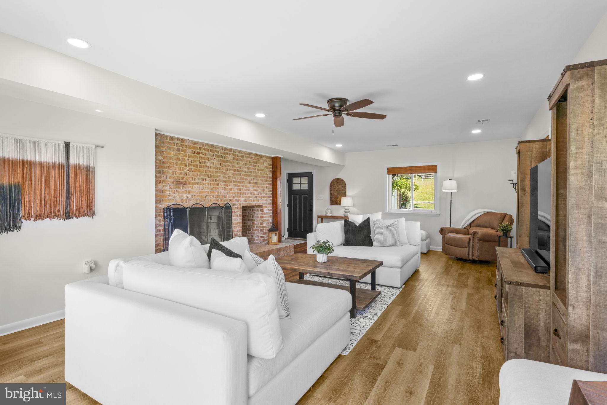 6970 Kim Lane Friendship, MD 20758 - Photo 19 of 50 Main Level Family Room with a fireplace