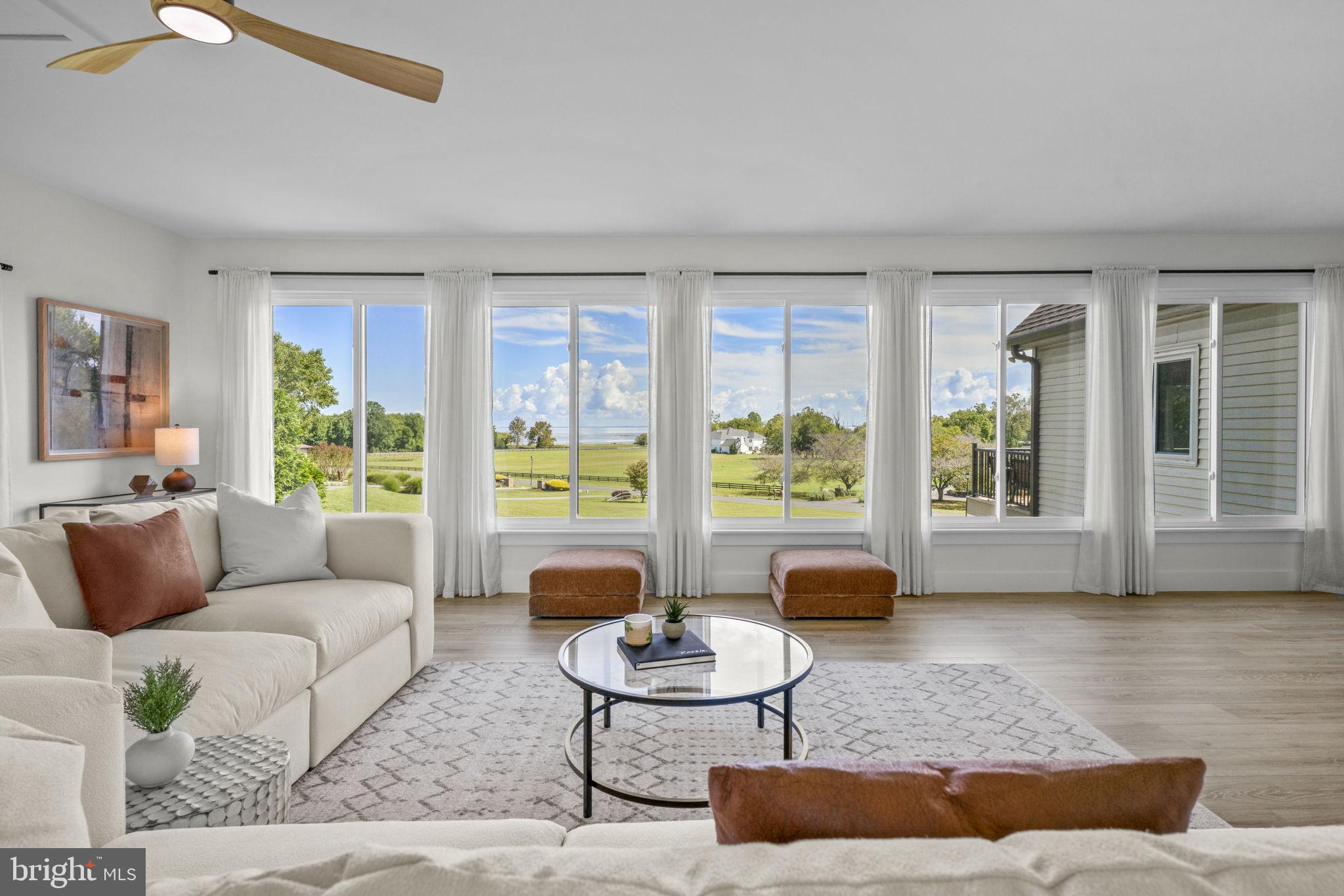 6970 Kim Lane Friendship, MD 20758 - Photo 2 of 50 a living room with furniture and a large window