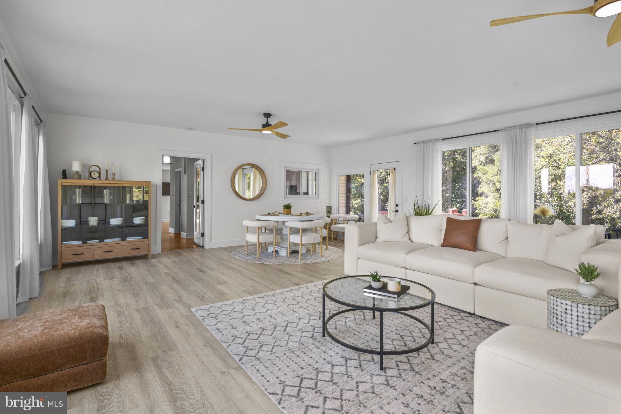 6970 Kim Lane Friendship, MD 20758 - Photo 24 of 50 a living room with furniture and a table