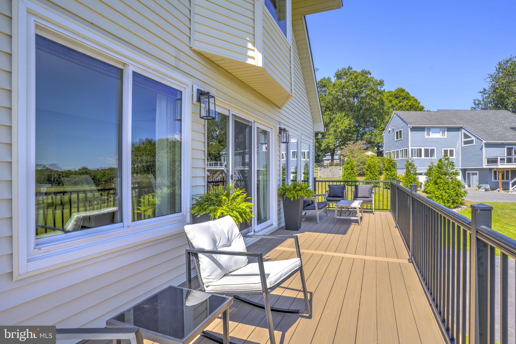 6970 Kim Lane Friendship, MD 20758 - Photo 26 of 50 a view of a house with backyard and sitting area