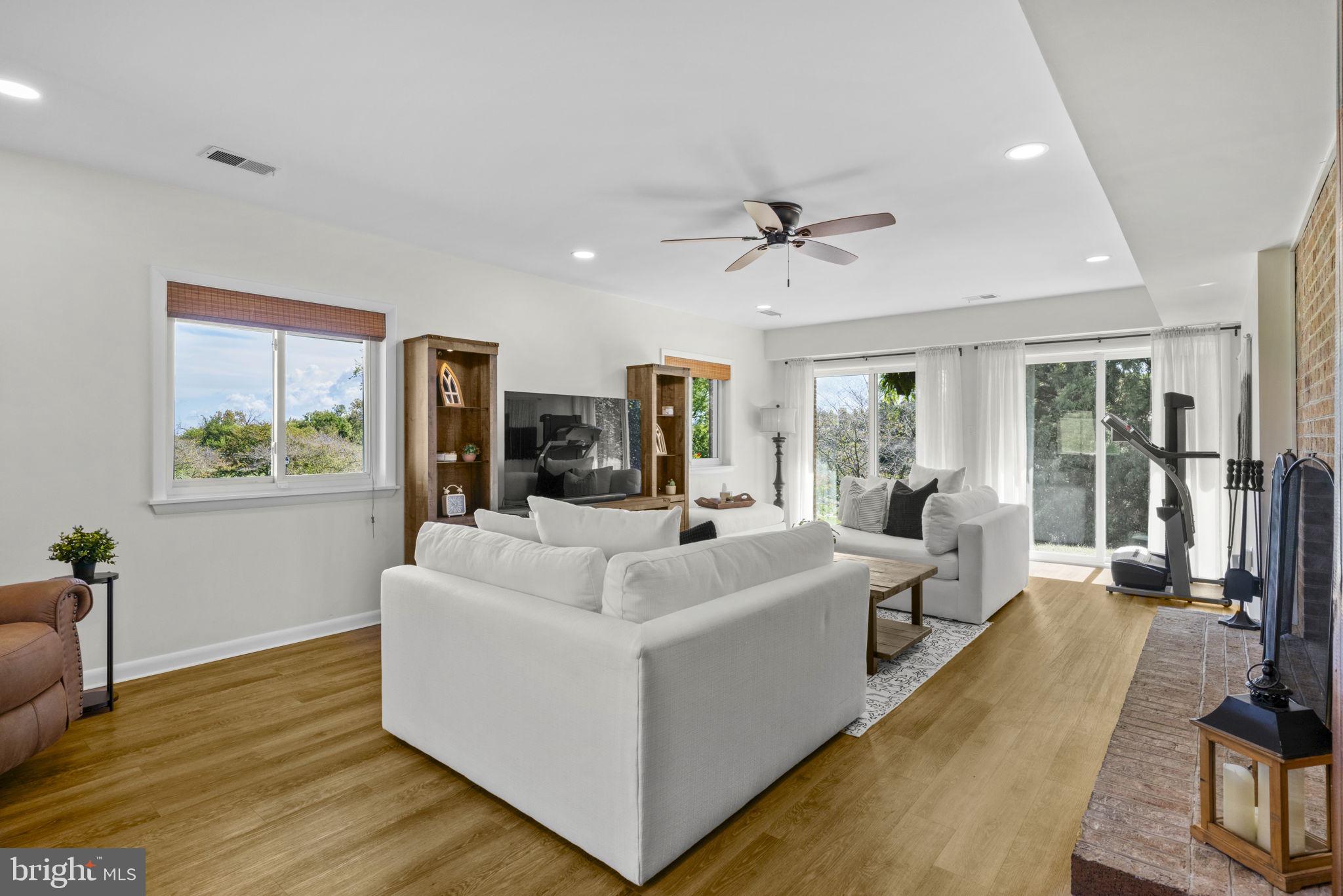 6970 Kim Lane Friendship, MD 20758 - Photo 33 of 50 a living room with furniture and a large window