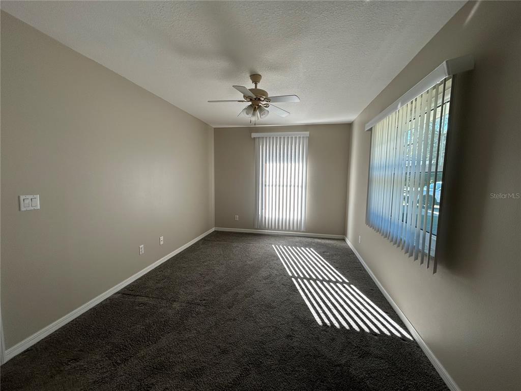 3764 East Sanders Street Inverness, FL 34453 - Photo 22 of 39 an empty room with windows