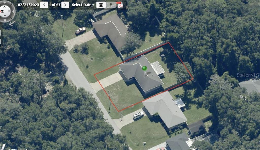 3764 East Sanders Street Inverness, FL 34453 - Photo 39 of 39 an aerial view of a house with outdoor space